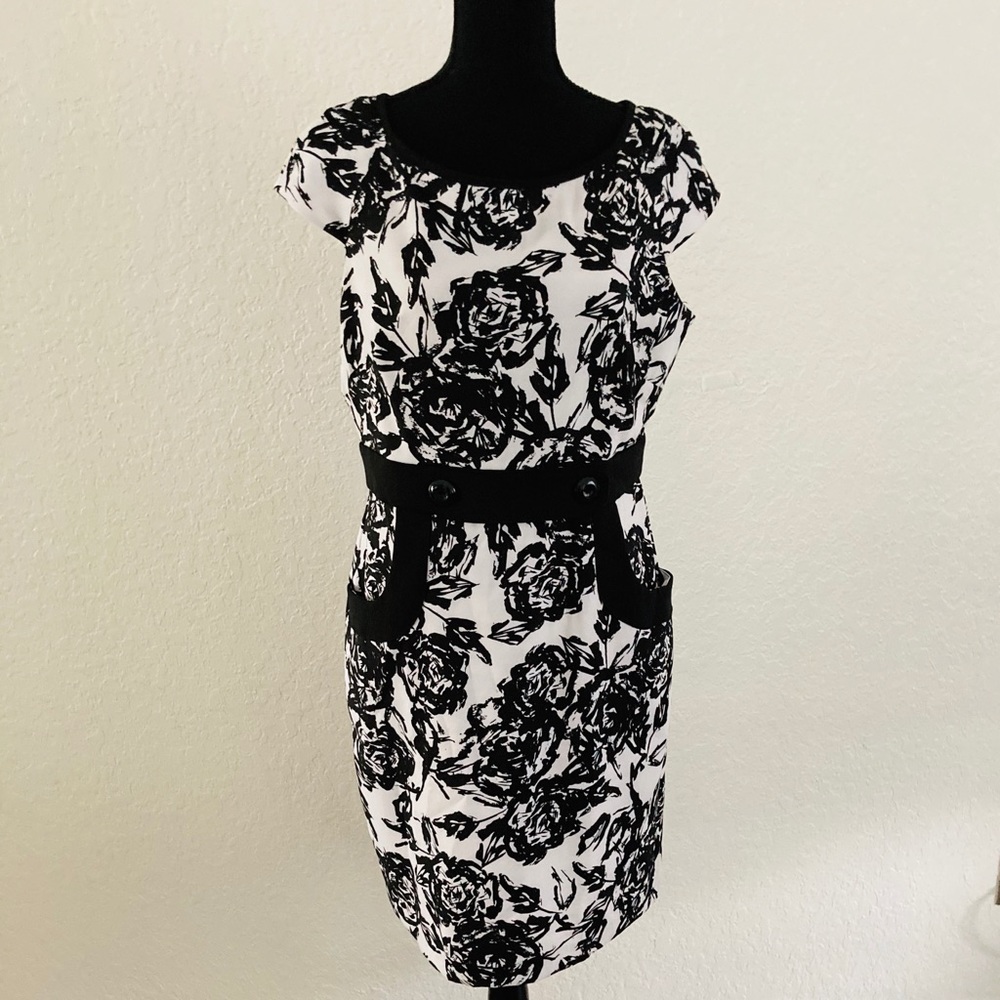 Dress 97% polyester, 3% spandex.